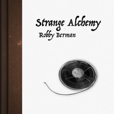 Cover of a book titled "Strange Alchemy" by Robby Berman, featuring a film reel and a brown spine on the left.